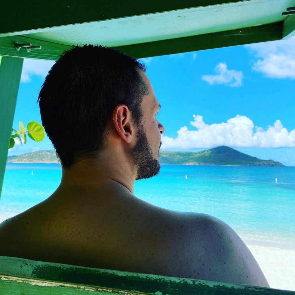 Man looking into the ocean
